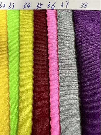 DG-BT recycled nylon glossy Lycra Composition: 82% recycled nylon 18% spandex Weight: 180g/㎡ Width: 150CM detail view-1